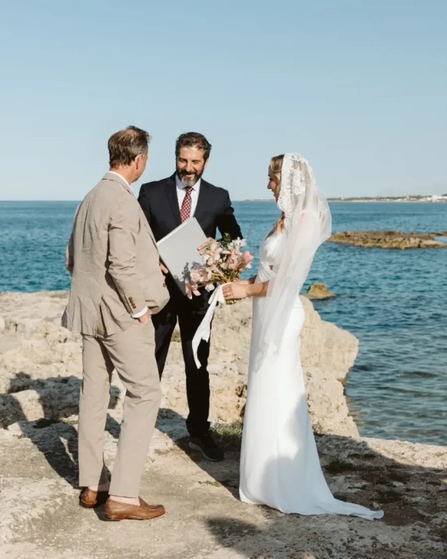 Marco Celebrant Marco leading a wedding ceremony on the rocks by the sea