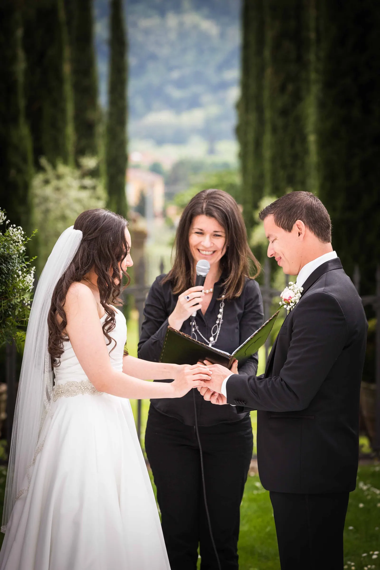 Symbolic ceremonies Symbolic wedding ceremony among cypress trees in Tuscany