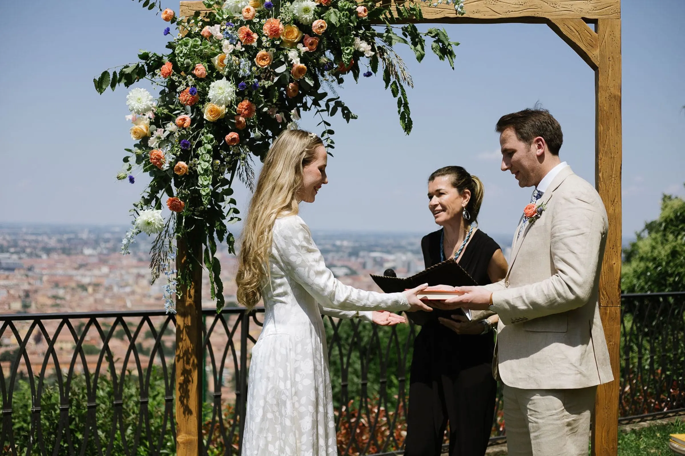 Finding the right words since 2009 Celebrant leading a symbolic wedding ceremony on a terrace overlooking Florence