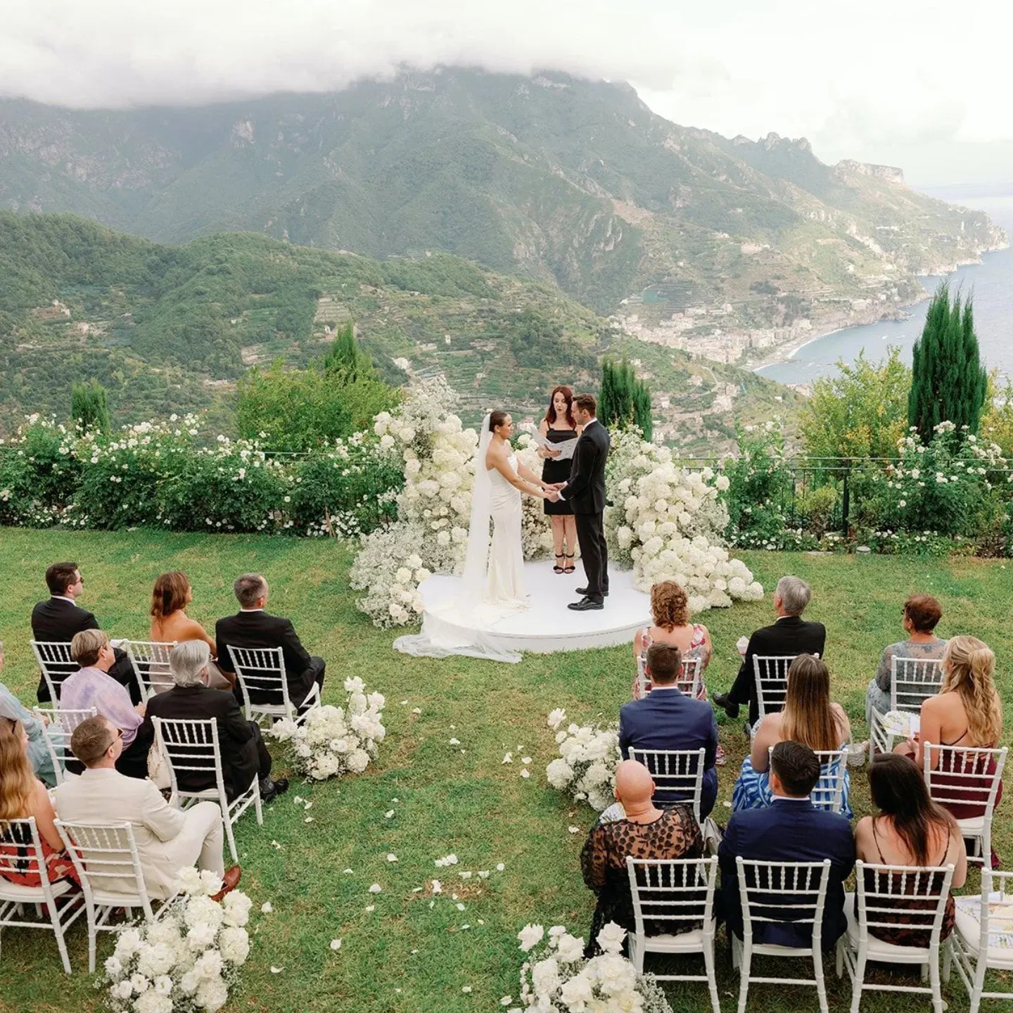 Wedding celebrants on the Amalfi Coast Wedding ceremony on a lawn terrace high above the sea on the Amalfi Coast