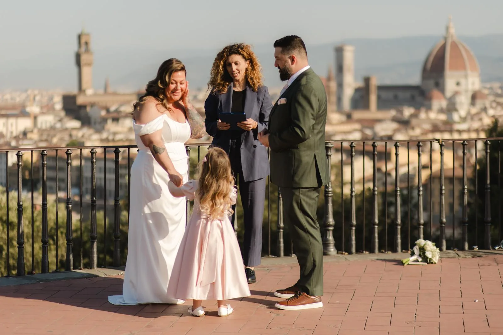 Claudia Claudia leading a ceremony on a terrace overlooking Florence and the Duomo